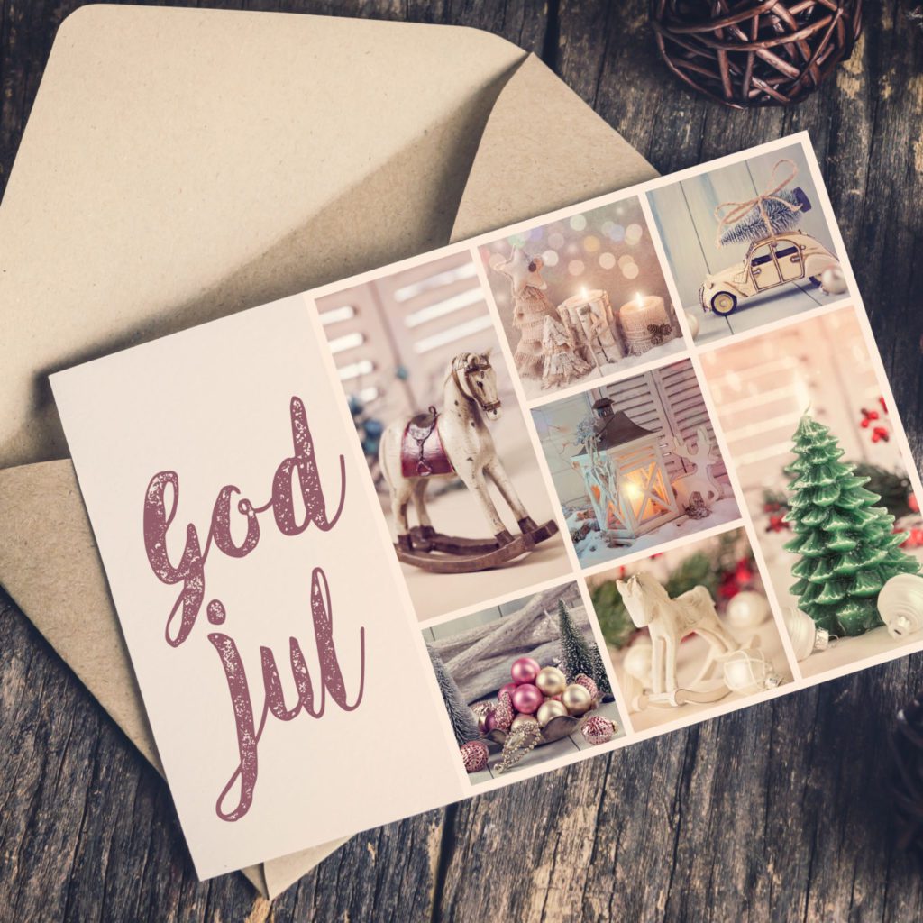 Blank white paper card with brown envelop and pine cones on old wooden table with vintage and vignette tone